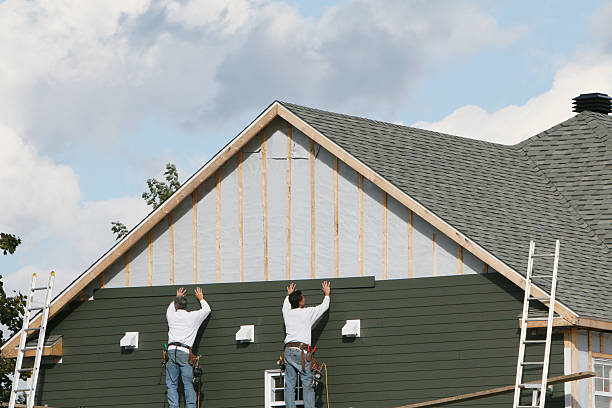 Professional Emergency Siding Repair technician working in Montgomery, IL